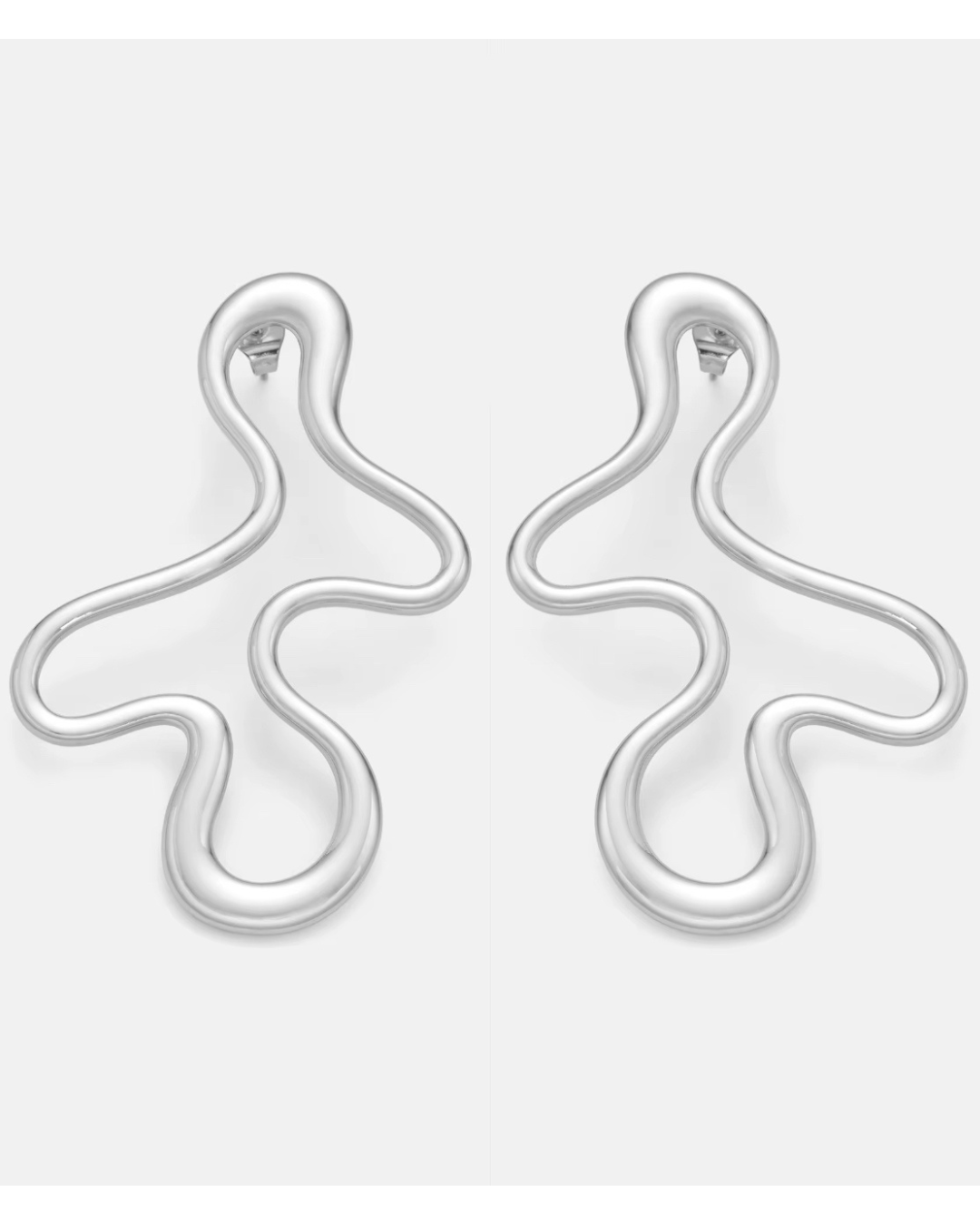 Abstract Baddie Earrings in sleek silver, contemporary sculptural hoops designed for women who want minimalist yet bold luxury vibes.