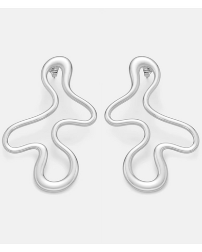 Abstract Baddie Earrings in sleek silver, contemporary sculptural hoops designed for women who want minimalist yet bold luxury vibes. 