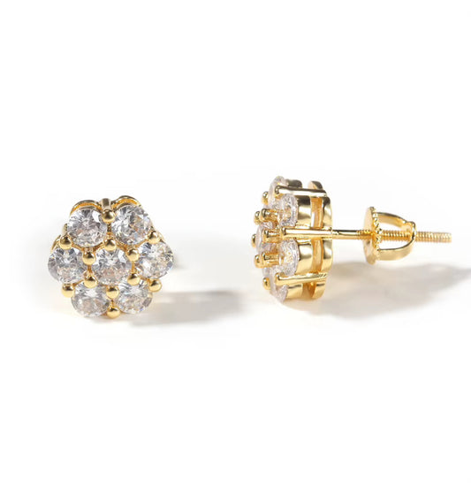 Pair of gold CZ flower cluster stud earrings, floral sparkle design on white background.