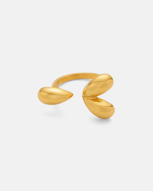 Modern Muse Ring in 18k gold with a polished finish and sculptural open band style. A bold yet refined luxury ring designed for women who love standout statement jewelry. 