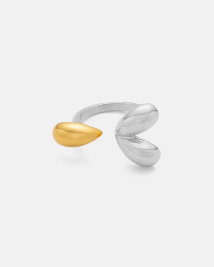 Modern Muse Ring in polished silver and gold with a sculptural open band design. A luxury statement ring that blends modern elegance with everyday versatility for women. 