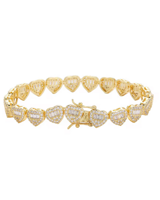 Queen of Hearts bracelet in gold with CZ stones. A bold tennis heart bracelet for women, designed as a statement piece that blends glamour with everyday chic. 