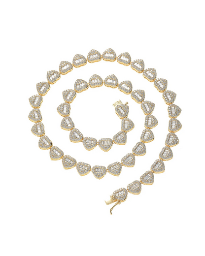 Queen of Hearts gold tennis heart necklace featuring CZ stones. A luxury statement chain designed for women who love romantic jewelry, timeless sparkle, and bold style. 