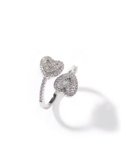 Queen of Hearts ring in silver with double CZ heart design. Elegant tennis-inspired sparkle crafted as a modern luxury ring for women with timeless romantic vibes. 