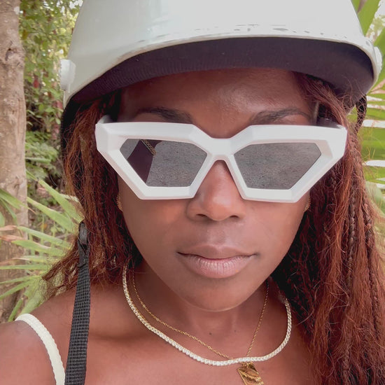 Vacation video in Tulum featuring a woman in swimwear wearing the Main Character Earrings in gold, styled with the I Am Enough Necklace and Essential Bae Tennis Necklace from I Am Luxury Accessories Boutique.